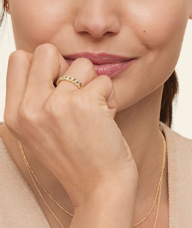 Model wearing a yellow gold fashion ring