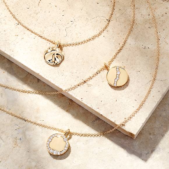 Three layered yellow gold necklaces