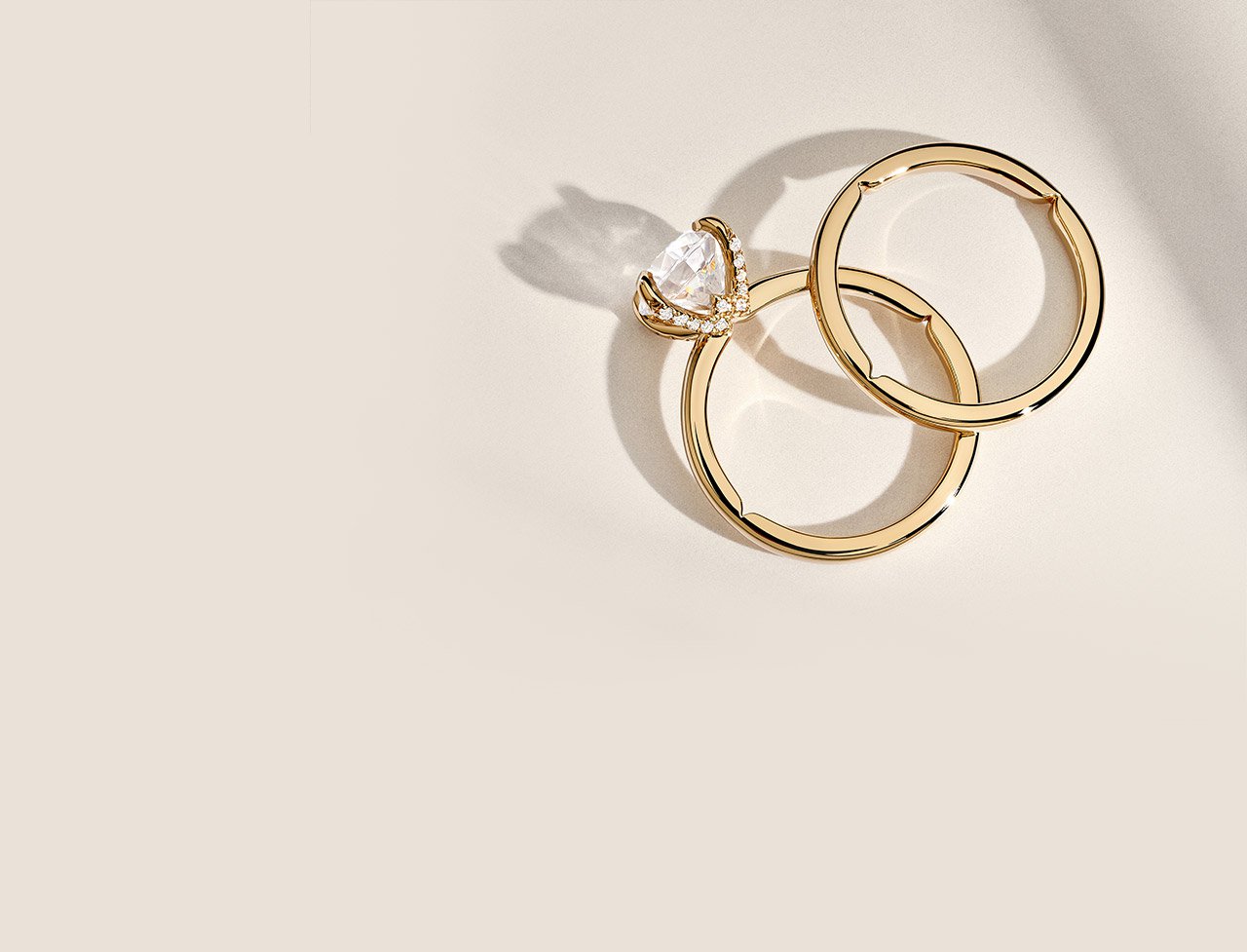 Gold diamond engagement ring and matching wedding band