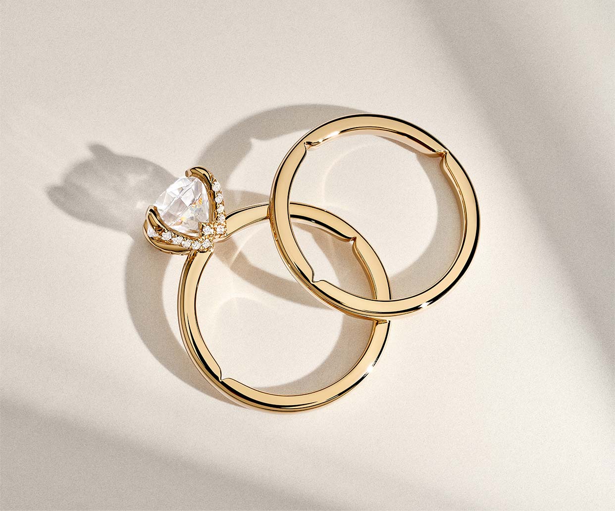 Gold diamond engagement ring and matching wedding band