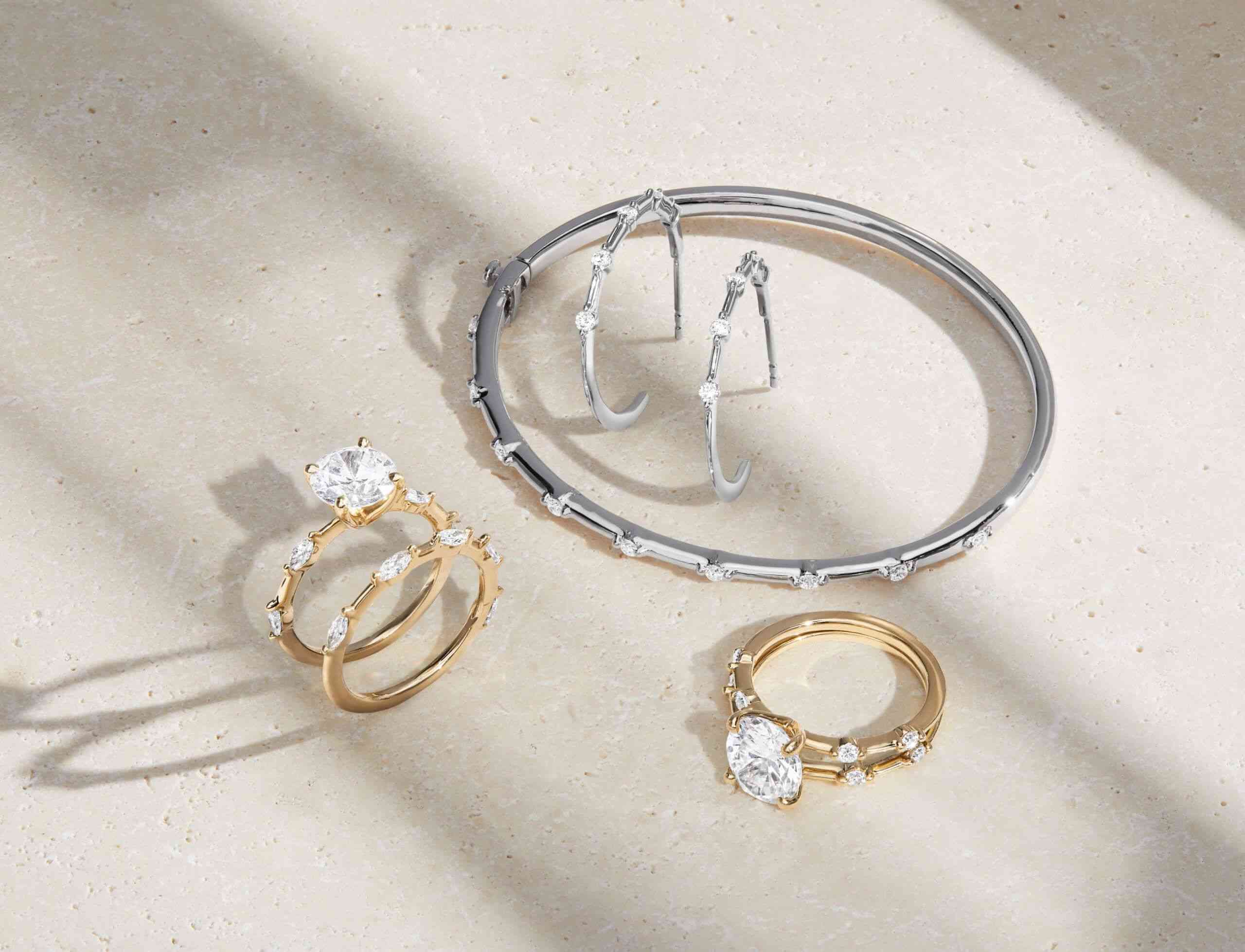 Assortment of diamond engagement rings, wedding rings, and fine jewelry from the Aimee Collection.