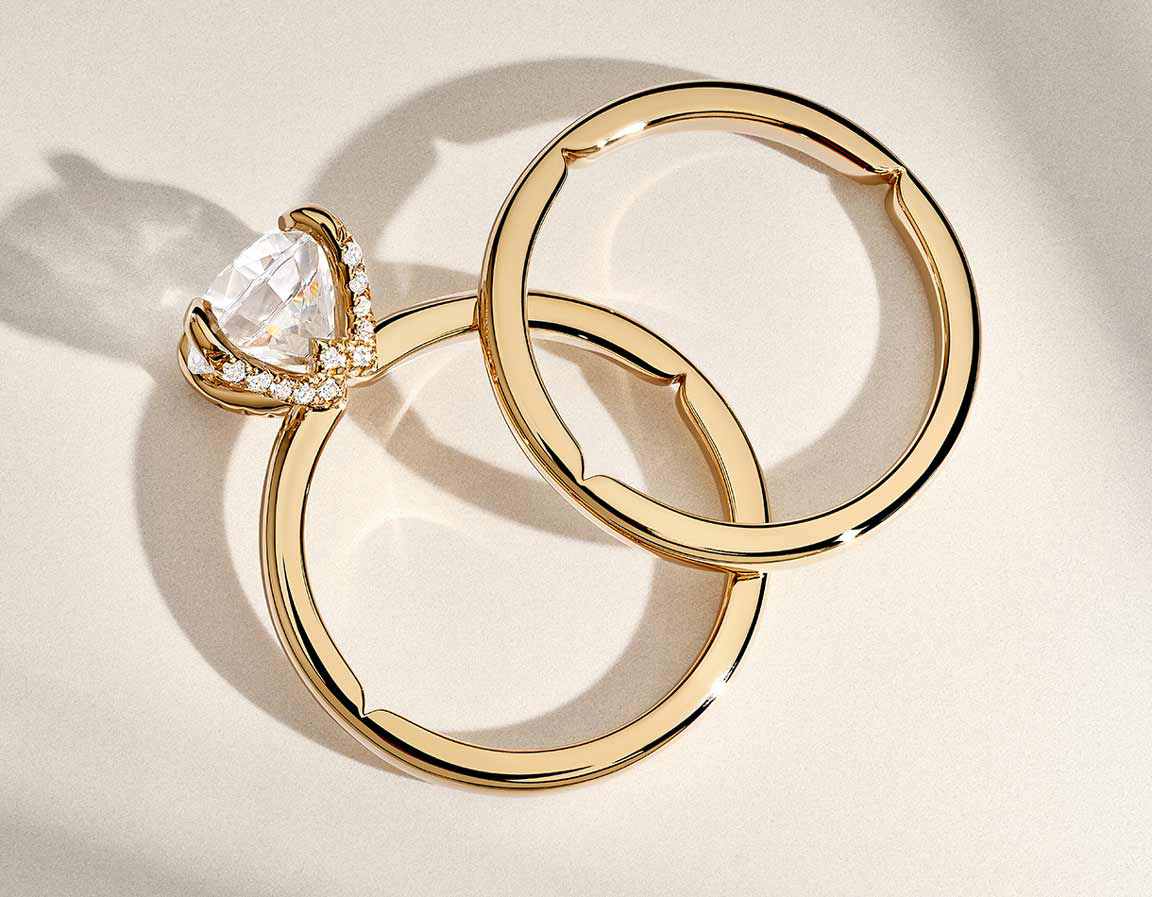 Yellow gold engagement ring and wedding ring with hidden details