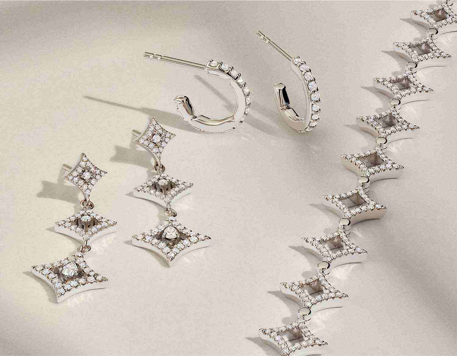 Lustrous diamond earrings and necklace