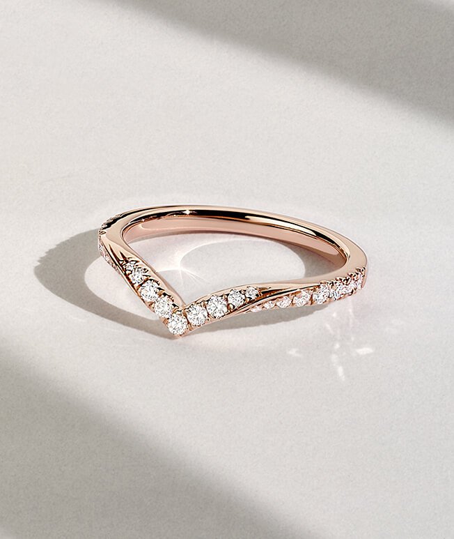 White gold round diamond ring on hand
