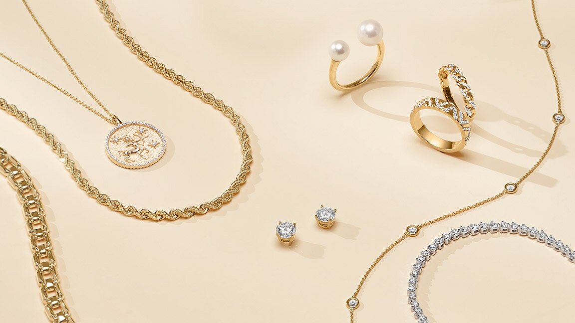 Assortment of gold and diamond fine jewelry.