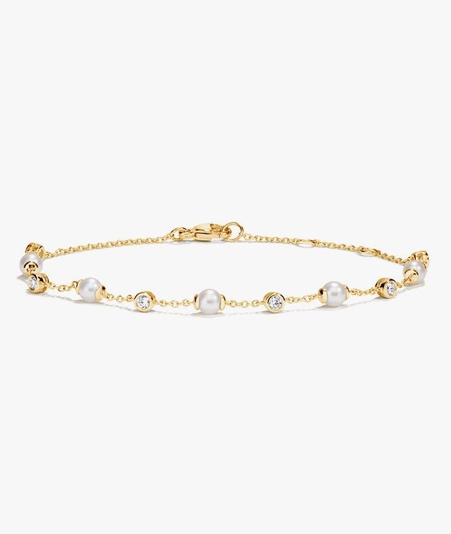 Yellow gold pearl and diamond bracelet