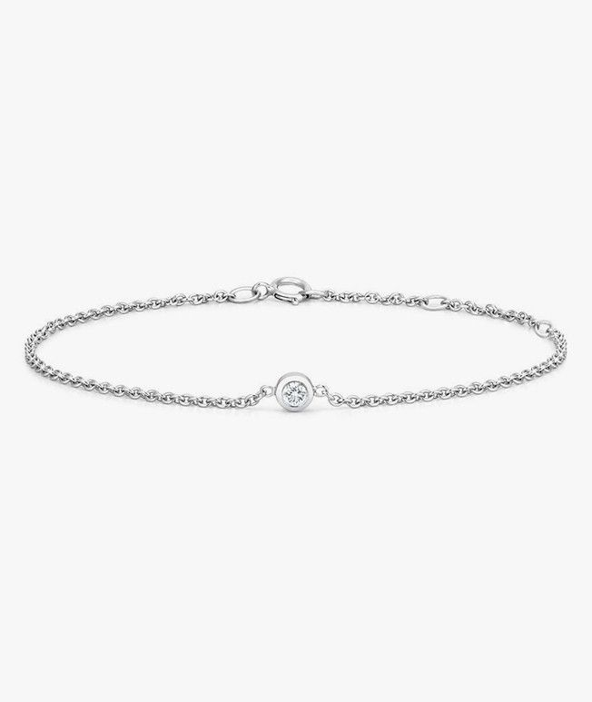 Silver bracelet with a diamond bezel accent 
