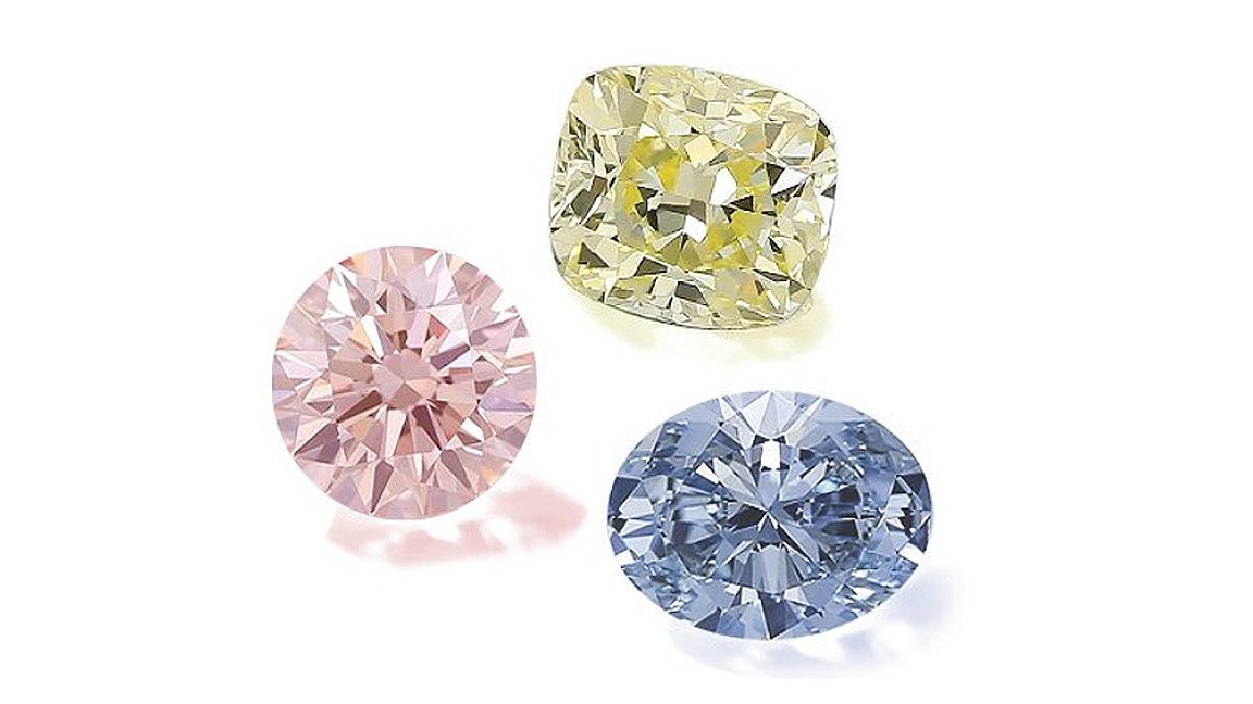 Pink, yellow, and blue colored loose diamonds