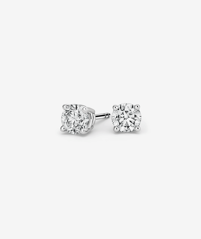 White gold round diamond stud earrings.