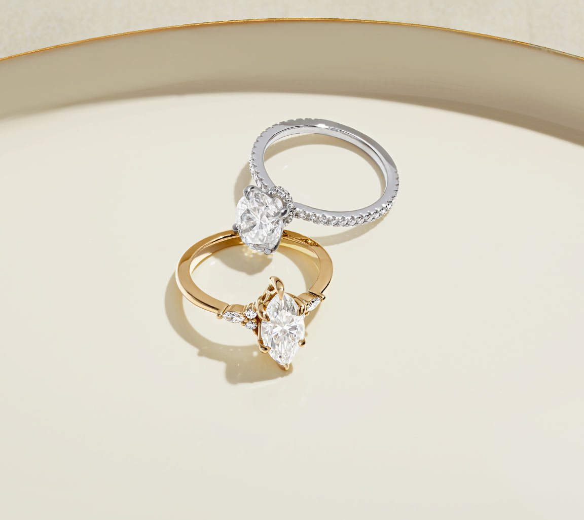 Two moissanite engagement rings