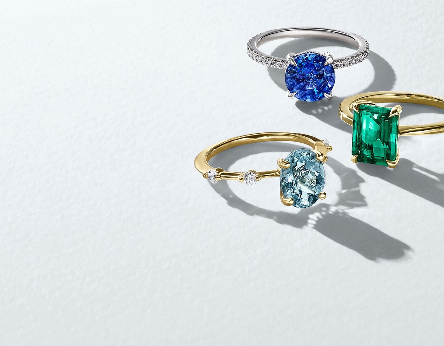 Assortment of gemstone engagement rings.