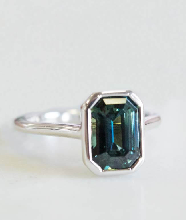 Teal gemstone white gold engagement ring