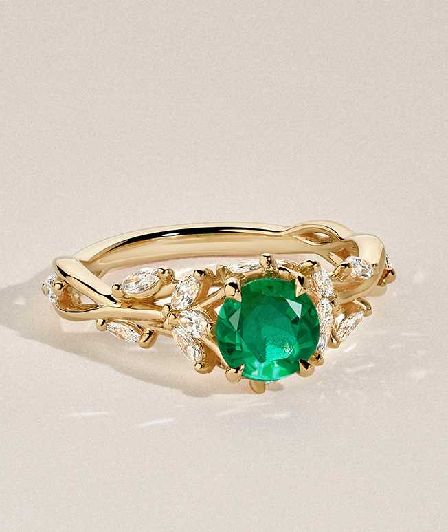 Emerald rose gold engagement ring