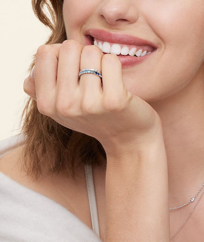 Model wearing a gemstone ring