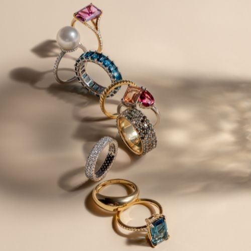 Assortment of gold and gemstone cocktail and fashion rings.