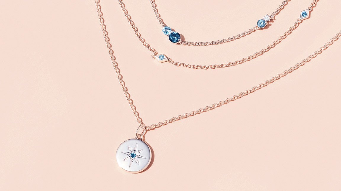 Layered blue gemstone necklaces