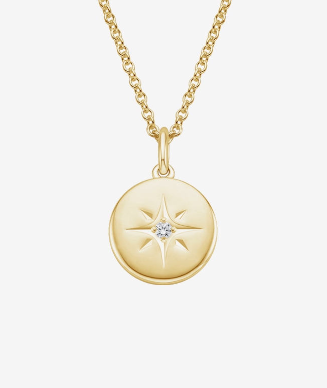 Yellow gold compass diamond pendant