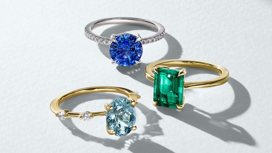 Assortment of gemstone engagement rings.