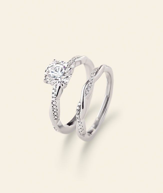 Silver engagement ring and wedding ring set