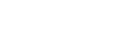 Woman smiling wearing diamond bridal set and diamond hoop earrings