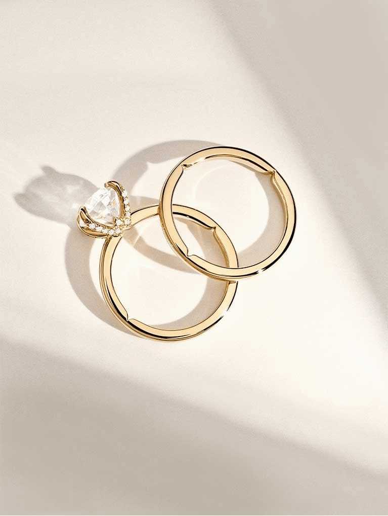 Yellow gold hidden halo engagement ring