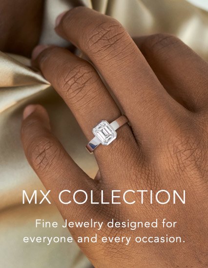 man wearing lustrous white gold diamond ring