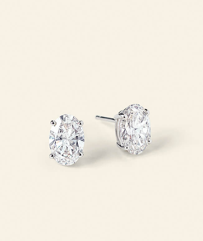 Oval diamond stud earrings
