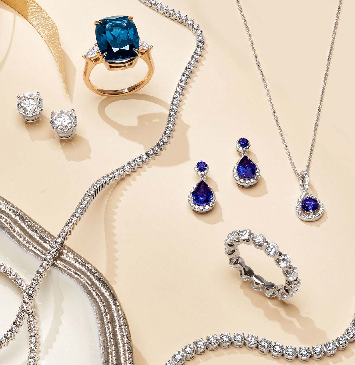Assortment of gemstone and diamond fine jewelry.