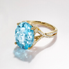 Variety of gold gemstone engagement rings.